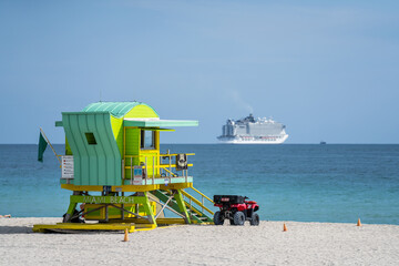 Miami Beach lifeguard tower with ship in background