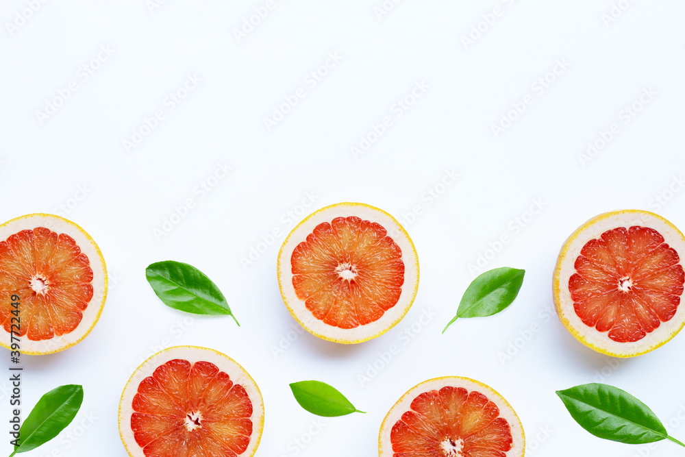 Wall mural high vitamin c. juicy grapefruit on white.