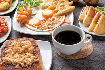 Variety of Breakfast Sets Weatern Style in the Morning on Gray Table