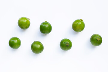Fresh limes isolated on white background.