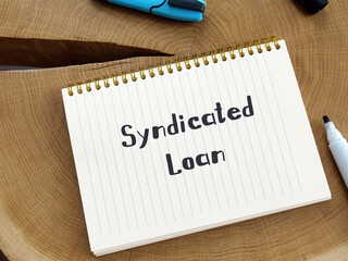 Conceptual photo about Syndicated Loan with handwritten phrase.