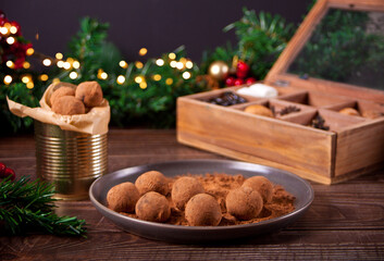 homemade chocolate balls truffles on the plate.