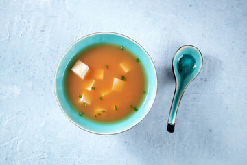 Miso soup with tofu and scallions, overhead shot