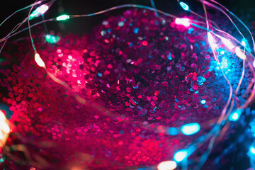 Colorful background with natural bokeh texture and defocused sparkling lights pattern. Blue and...