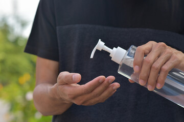 Man using alcohol gel cleaning hand protect coronavirus covid19