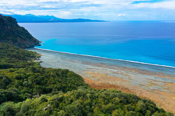 Aerial view of Plage de Nonza, the long black beach at the base of the cliffs on which stands the...