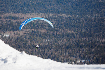Paragliding over the mountains.