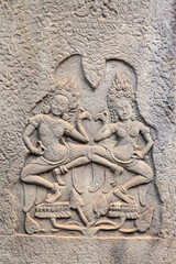 Wall carving with two dancers apsaras, Angkor Wat, Siem Reap, Cambodia