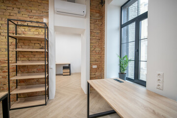 Picture of a room with wooden furniture