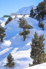 Winter Mountains landscape with snow covered peaks Against blue Sky in Saklikent Antalya Turkey