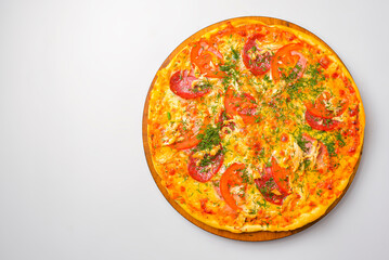 Pepperoni pizza on a white background. Traditional Italian pizza with tomatoes and meat isolated on white.