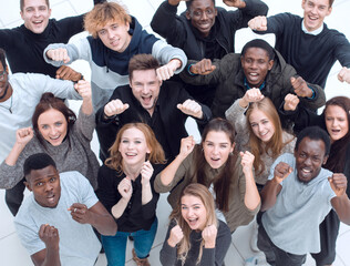team of diverse young people looking at the camera