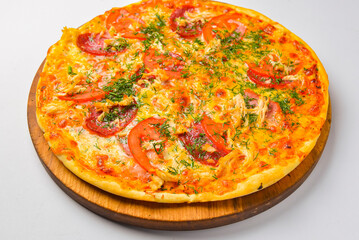 Pepperoni pizza on a white background. Traditional Italian pizza with tomatoes and meat isolated on white.