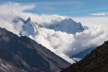 Kangtega and Thamserku mountain peak above the clouds view from Kalapattar view point, Everest base camp trekking route, Himalaya mountains range in Nepal