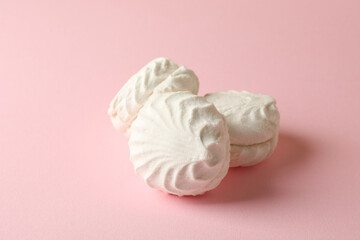 Sweet marshmallow on pink background, close up