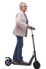 side view. modern elderly woman with electric scooter