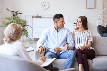 Fototapeta premium Psychologist working with young couple in office