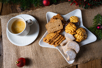 Different types of biscuits with rustic Christmas decorations