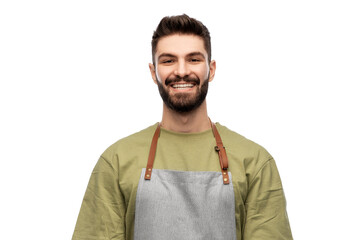 people, profession and job concept - happy smiling barman in apron over white background