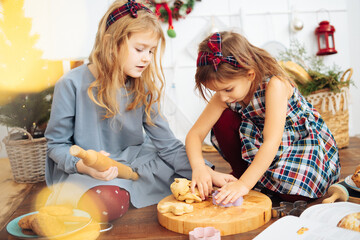 children bake cookies for christmas