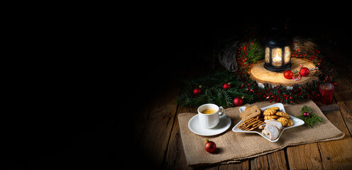 Different types of biscuits with rustic Christmas decorations