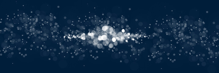 Abstrakte Wolke aus Lichtpunkten und Lichtreflexen auf blauen Hintergrund