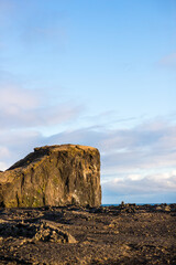 Fototapeta na wymiar A cliff on the coast of Reykjanes Iceland and clear sky