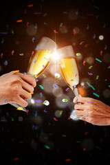 Young couple hands holding champagne glasses