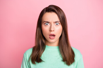 Fototapeta premium Photo portrait of astonished stressed female student with opened mouth staring isolated on pastel pink color background