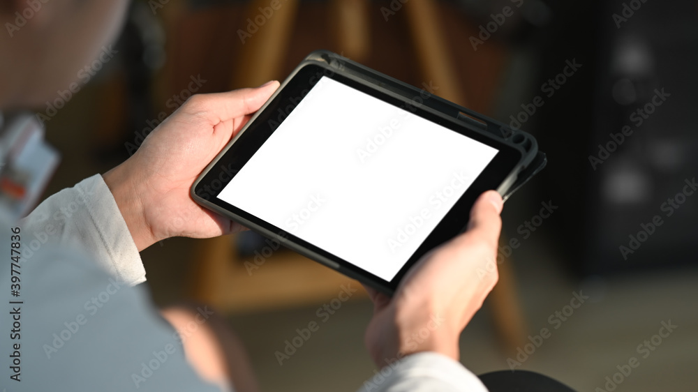 Poster man hands holding computer tablet. blank screen for graphics display montage.
