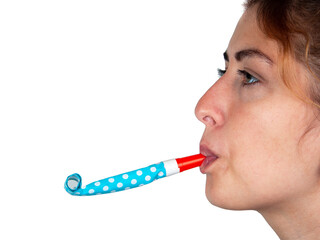 Girl with party whistle noismaker isolated on the white