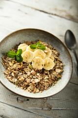 Traditional homemade granola with fresh banana
