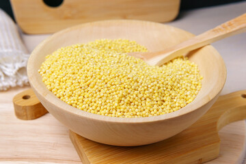 Millet groats, close up. Gluten-Free and non-allergenic grain use in vegetarian cuisine. cooking porridge