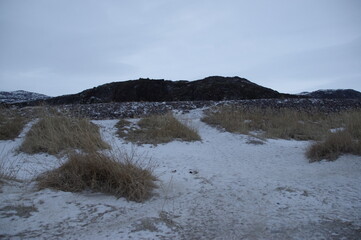 Winter beach in the village of Teriberka in the Murmansk region