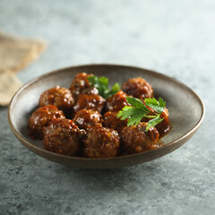 Homemade spicy meatballs with fresh parsley