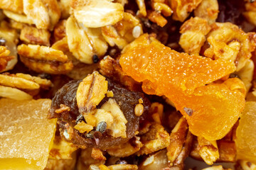 muesli heap, granule texture as background, baked muesli healthy Breakfast, close-up macro