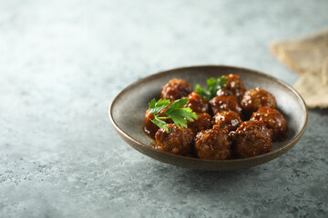 Homemade spicy meatballs with fresh parsley