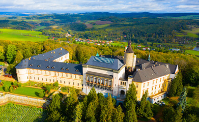 Fototapeta na wymiar Scenic aerial view of impressive medieval Zbiroh castle on sunny autumn day, Rokycany district, Czech Republic