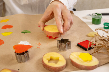 DIY potato print. handmade gift wrapping with an exclusive print pattern.