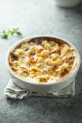 Homemade cauliflower gnocchi casserole with cheese