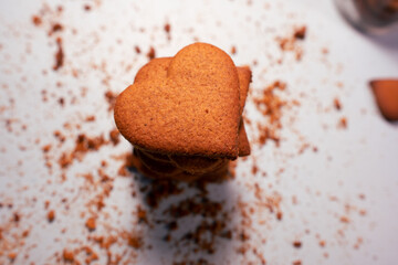 Homemade heart shaped cookies on bright background