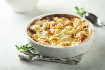 Homemade cauliflower gnocchi casserole with cheese