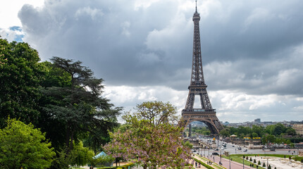 View of Eiffel Tower from Trocadero Park on an overcast spring day.