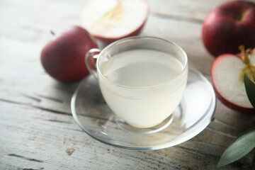 Fototapeta na wymiar Healthy homemade apple drink with spices