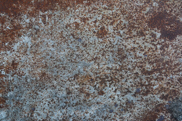 Rust on surface of the old iron, decay and grunge background.