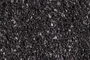 Close-up activated carbon texture. Coconut charcoal.