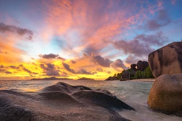 Washable wall murals Anse Source D'Agent, La Digue Island, Seychelles sunset at tropical beach in paradise on anse source d'argent on ladigue, seychelles
