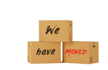 Three closed, brown cardboard moving storage boxes with We Have Moved text on them over white background