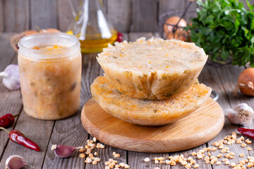 Frozen soup on a wooden background. Frozen food