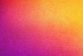 Textured blurred yellow orange magenta background.